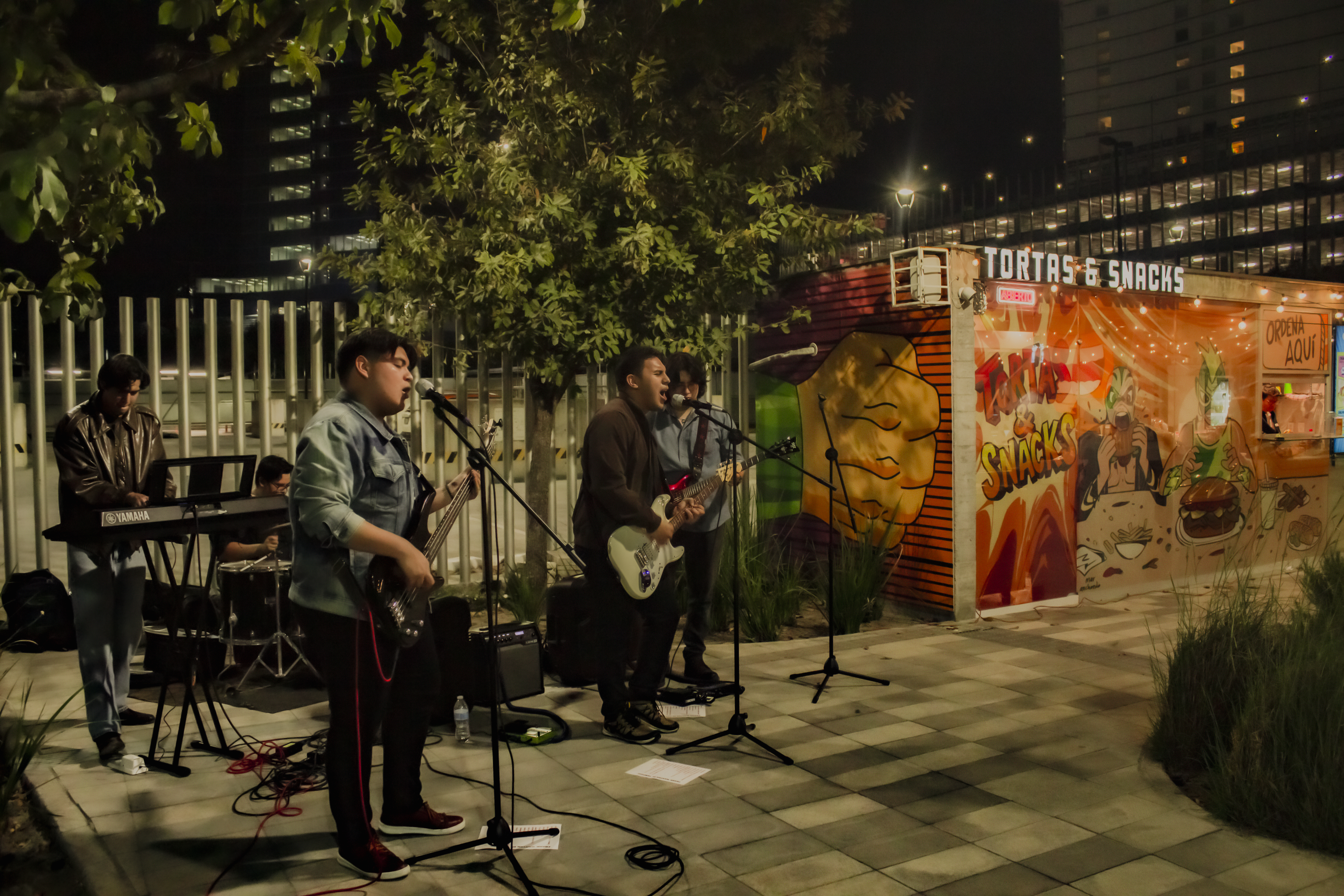 Urban night skyline with glowing signage