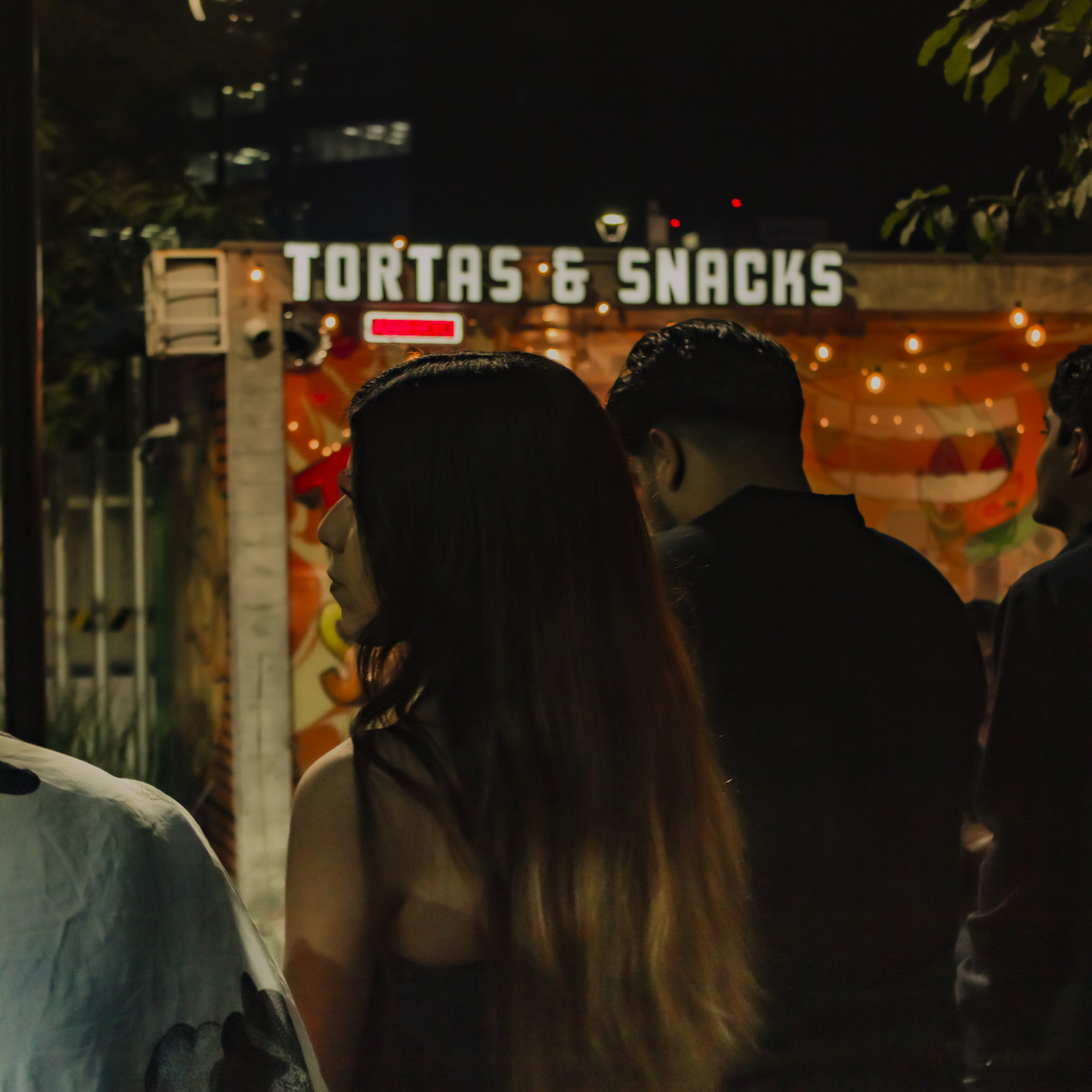 Masked street performer at dusk